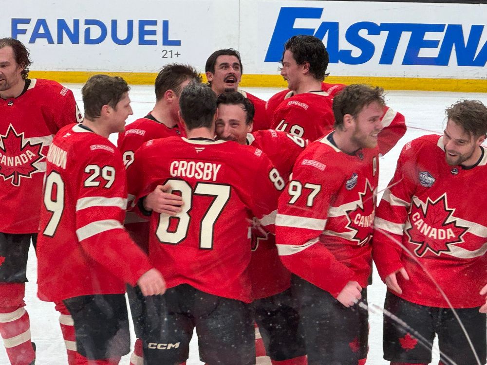 Team Canada celebrating their victory of USA in hockey.