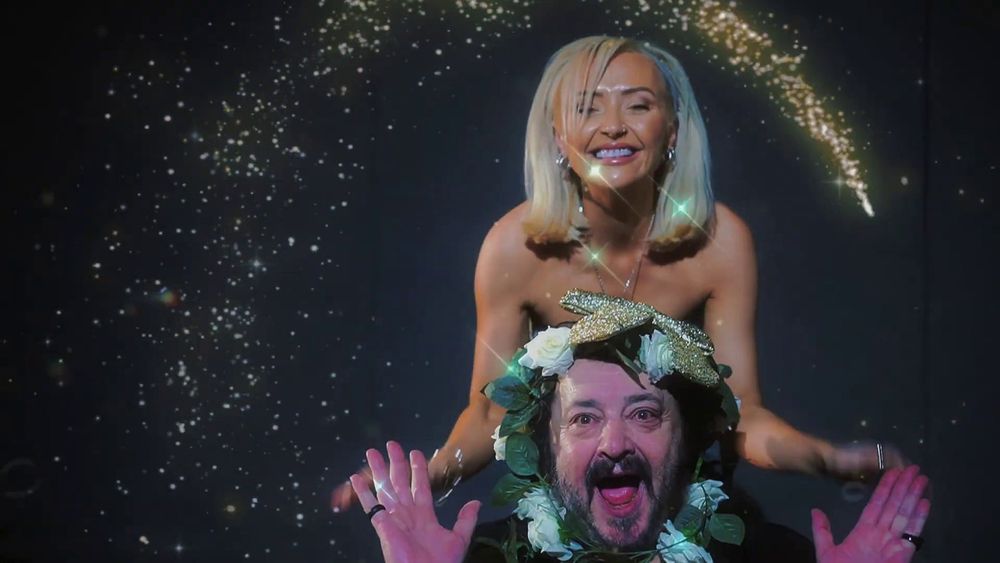 Ivan Kaye making fun with one of the other celebs in the music video of the single