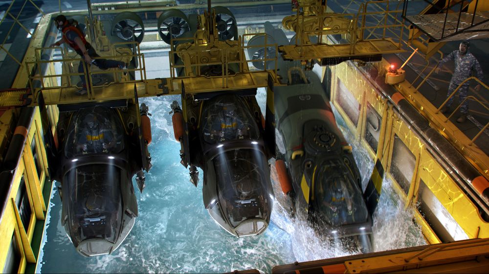 Maki submarines being dropped in the Sea Dragon moon pool 