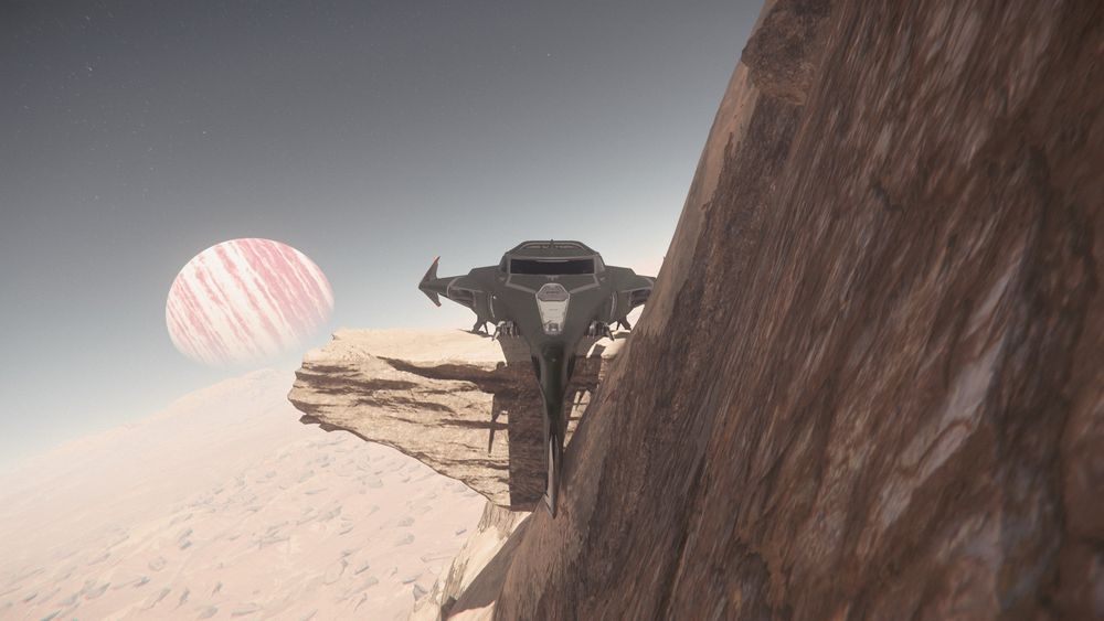 Un 400i est posé sur une lune de Crusader (système Stanton), tel un aigle sur son perchoir.