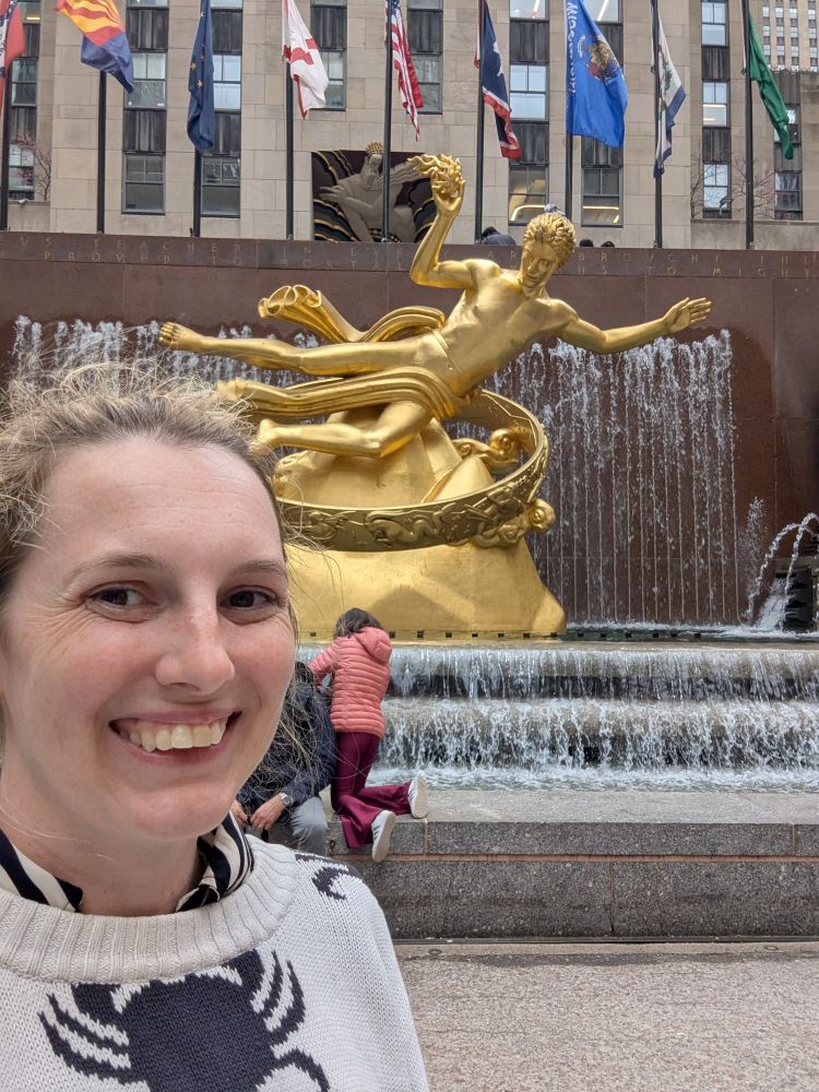 Selfie standing in front of the golden statue of Prometheus at the Rockefeller Center in NYC