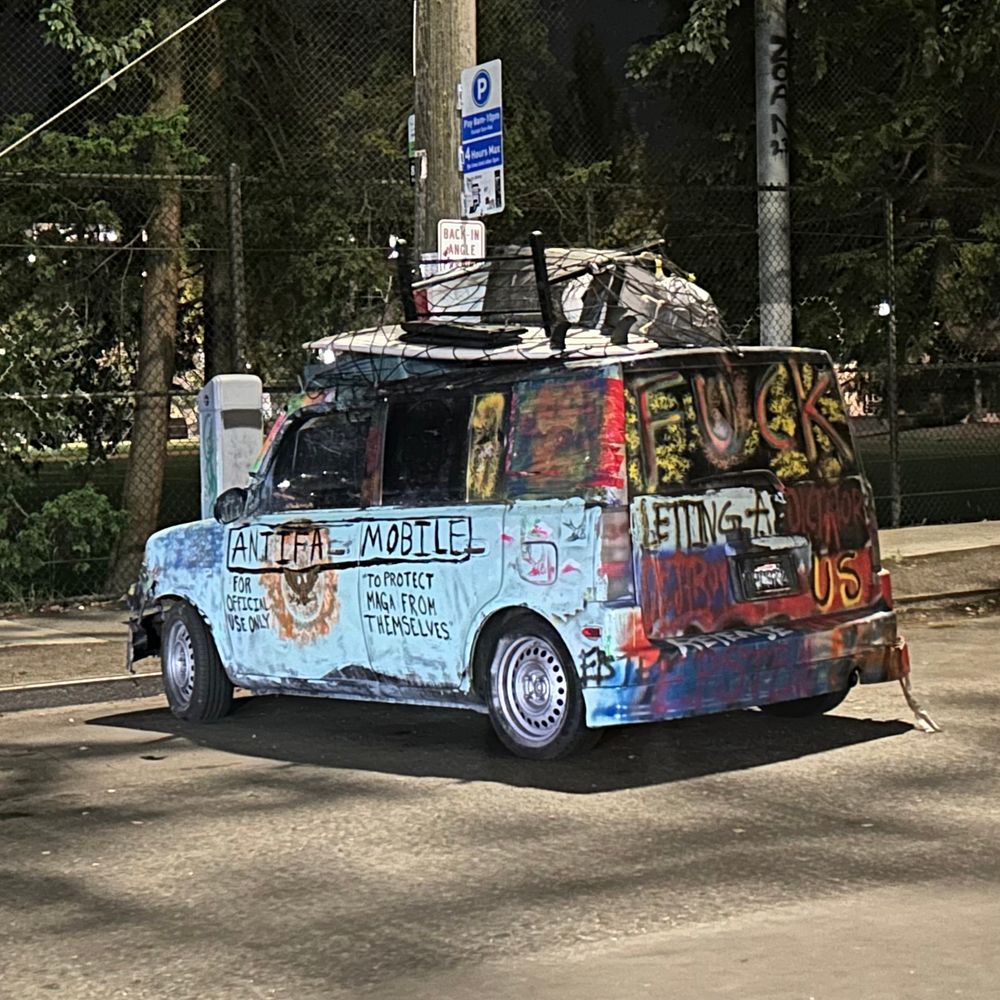 Antifa mobile covered with graffiti art parked in Capitol Hill Seattle. 