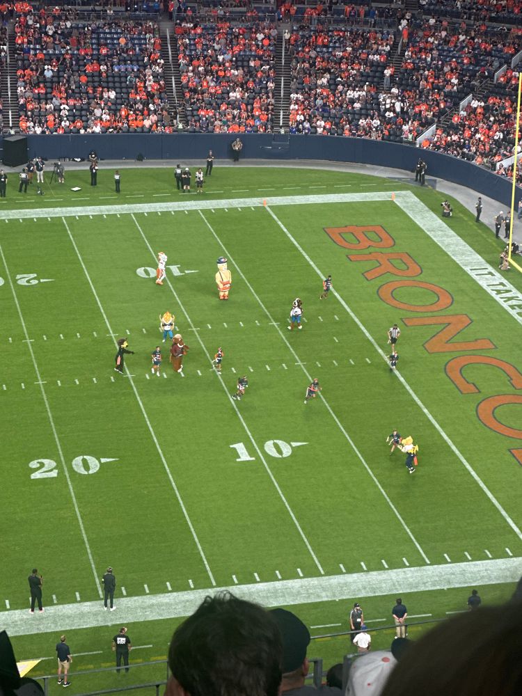 Mascots vs kids game at broncos game 