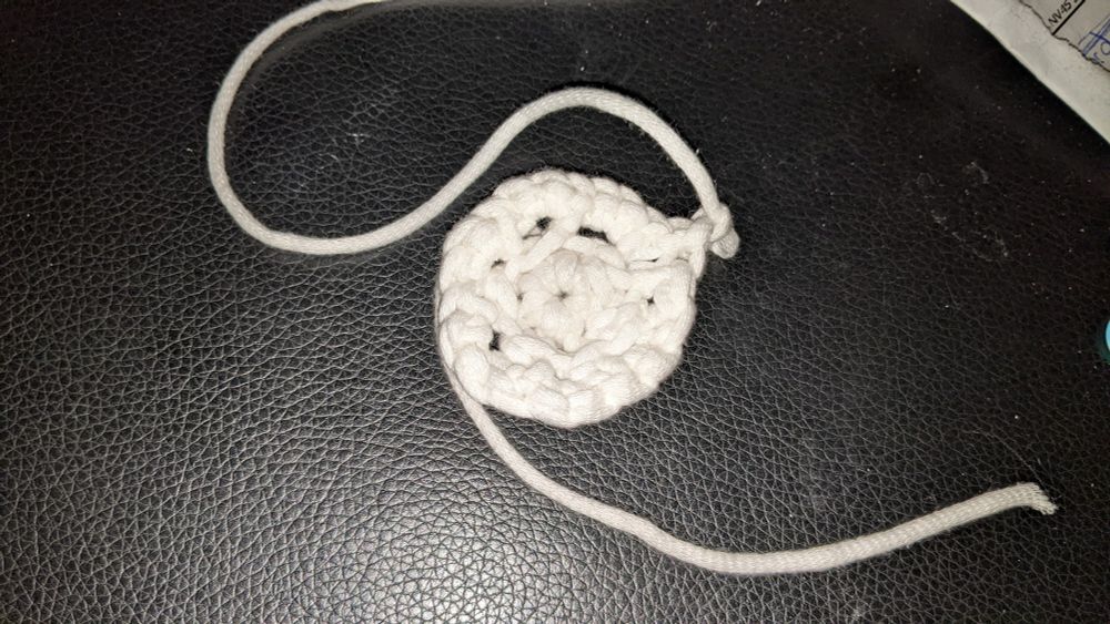 The beginning three circles of a crochet project 