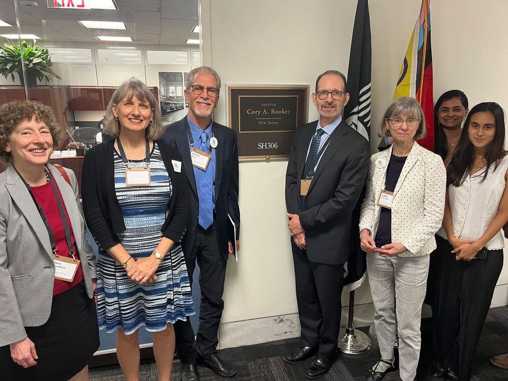 Photo of Citizens' Climate volunteers standing outside the office of Senator Booker, NJ, with staff.