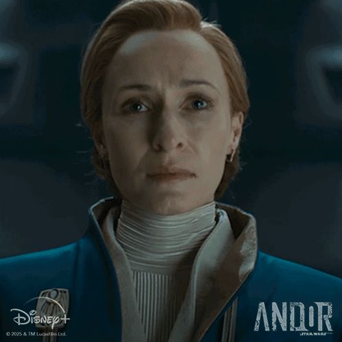 a close up of a woman 's face with the word andor on the bottom right