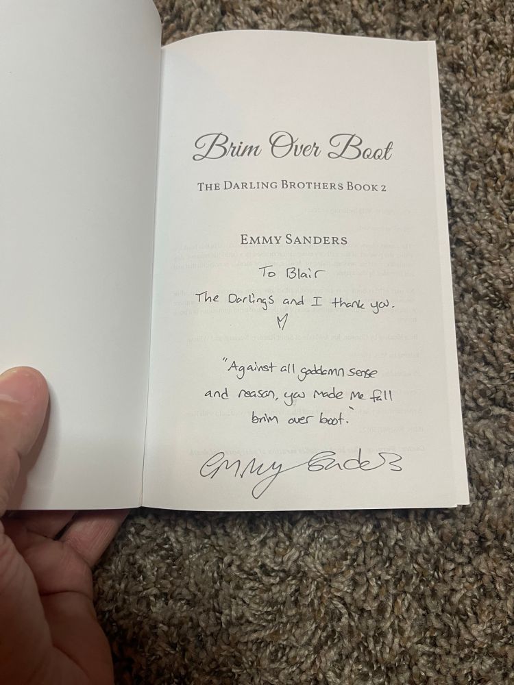A note inside the book. 
“Brim over boot”
The darling brothers book 2 
Emmy sanders 
To Blair the darlings and I thank you 🩵 
“Against all goddamn sense and reason you made me fall brim over boot” 
