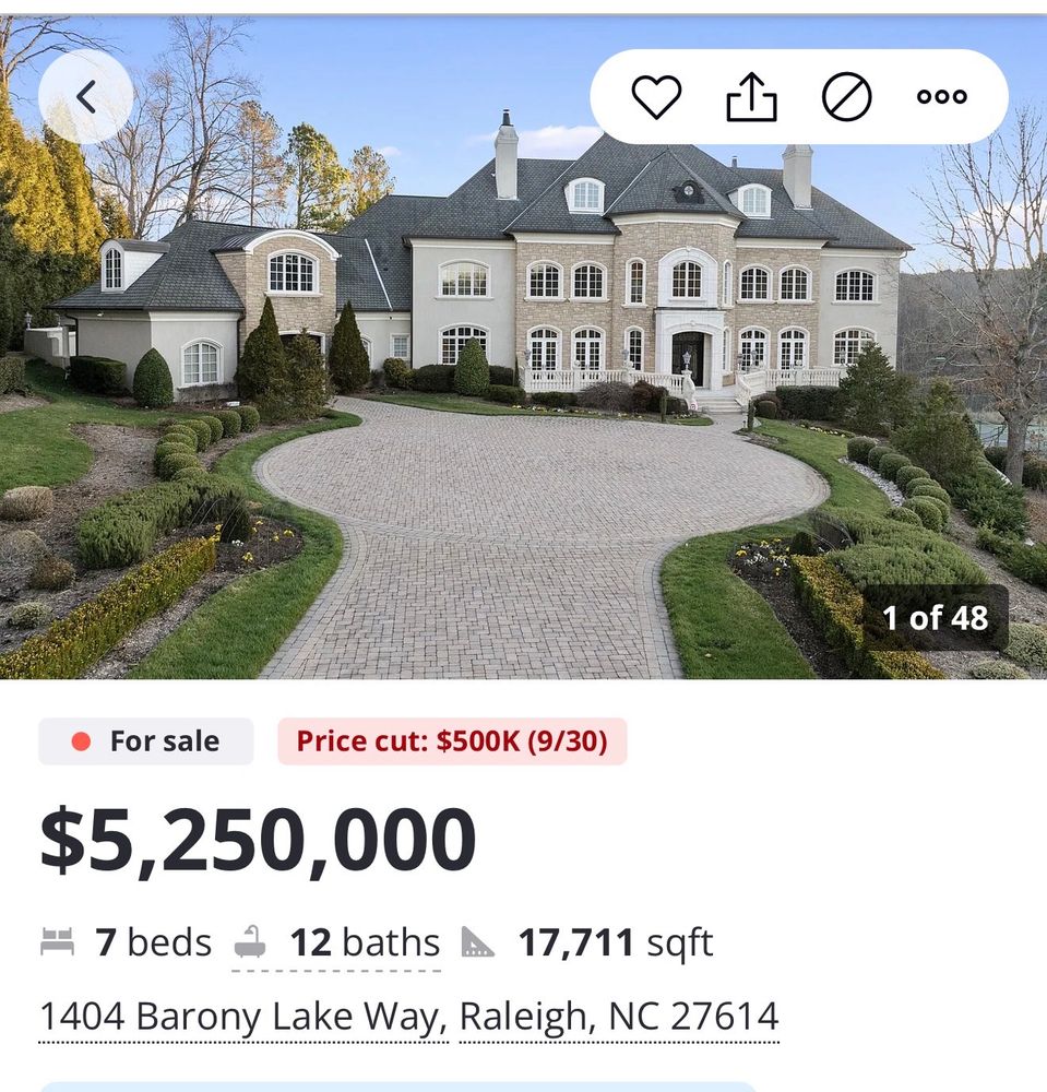 A massive and gaudy mansion in Raleigh, NC is shown with a listing price of 5 and a quarter million 

It has 7 bedrooms, 12 bathrooms, and 6 fireplaces 
