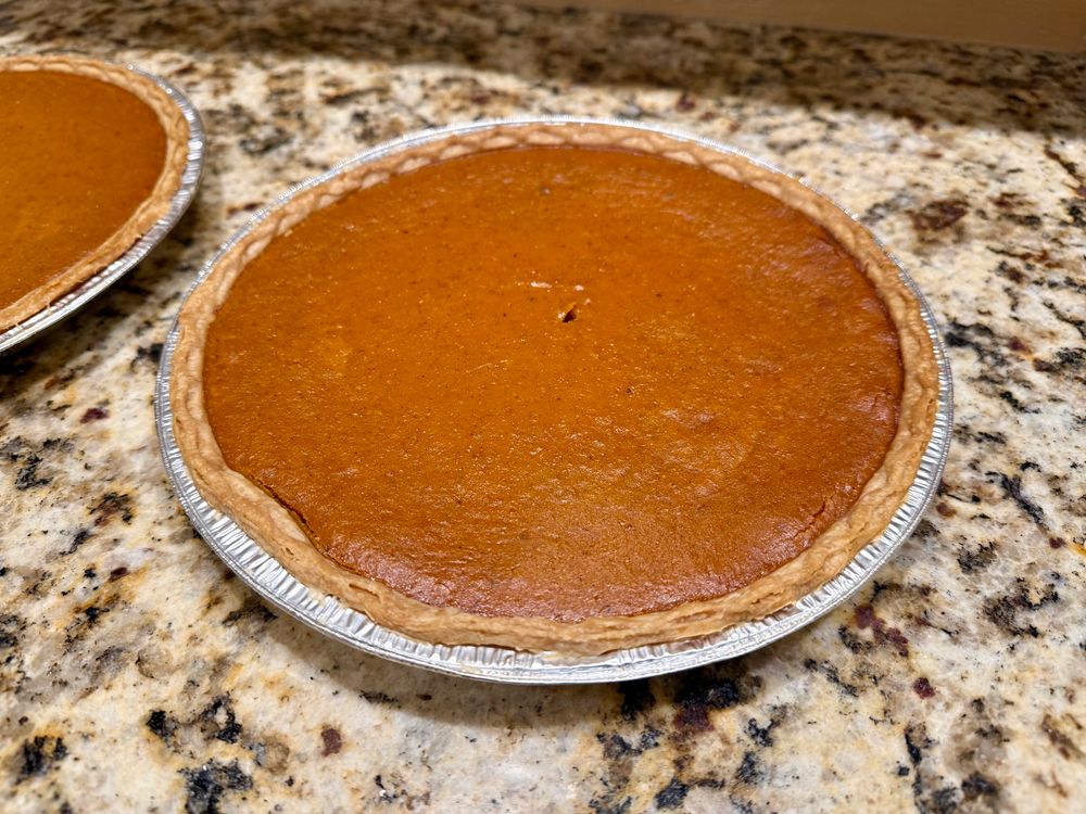 Pumpkin pie. Mom’s recipe, but I’m lazy, so I use the pre-made frozen pie crust in the foil tins.