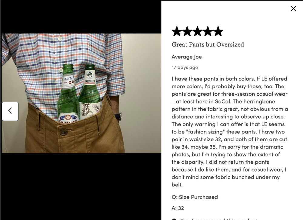 Review for a pair of pants with a picture of a guy who has shoved two bottles of N/A Peroni into his pants to demonstrate how baggy they are. Review reads: 