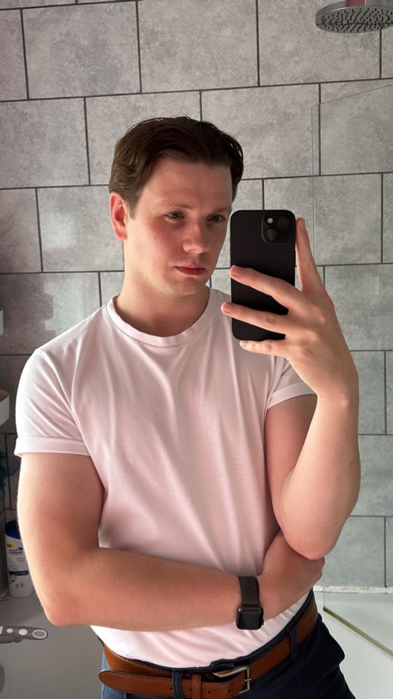 Selfie of Ken in a white T-shirt 