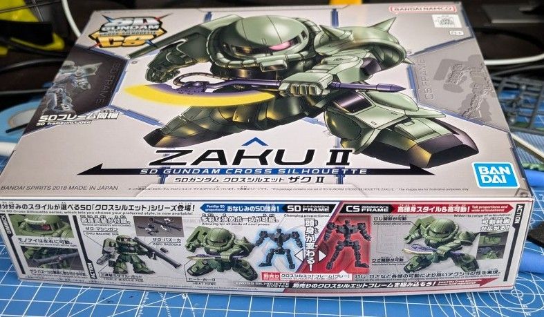 The SD Gundam Cross Silhouette Zaku-II gunpla box.