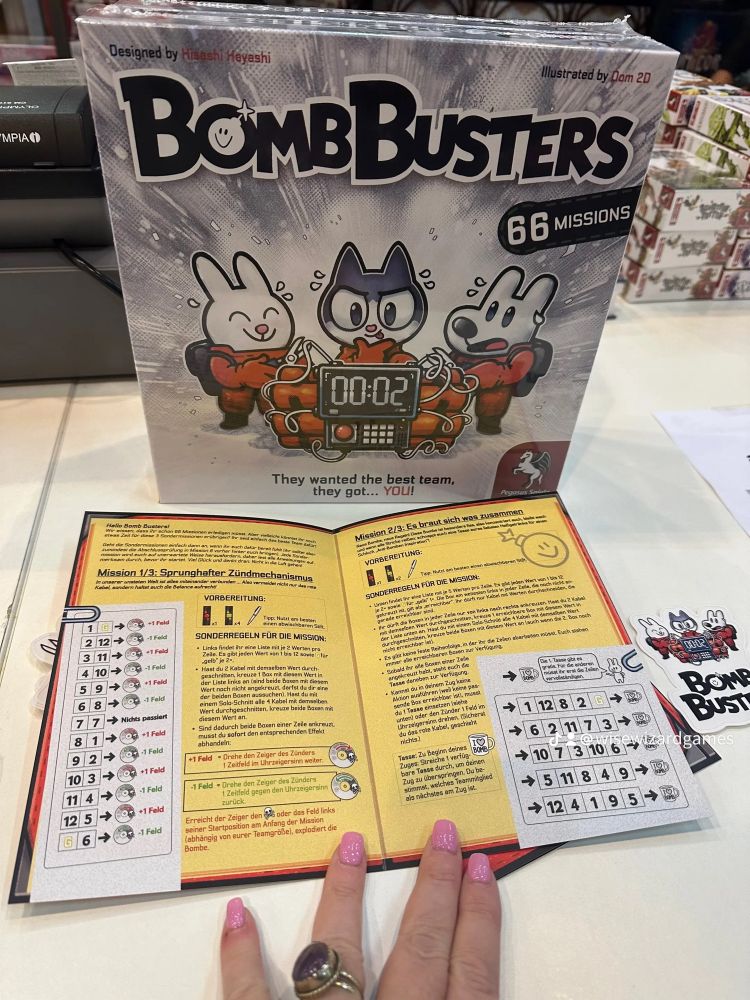 an image of Bomb Busters the game with the rulebook open 