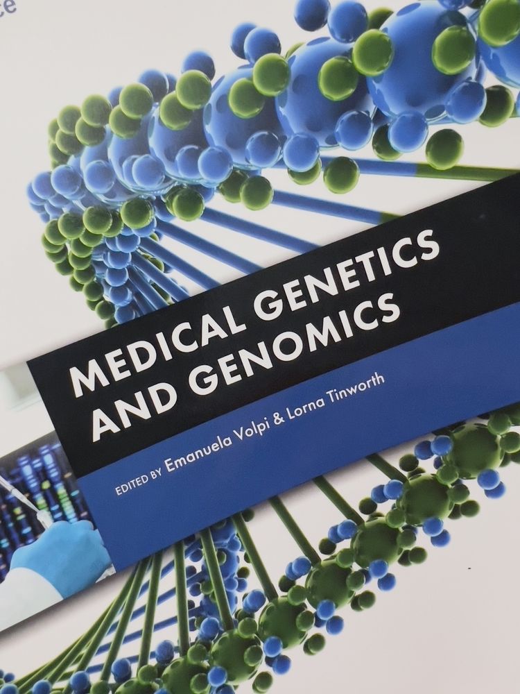 A textbook cover features the title "Medical Genetics and Genomics" with images of DNA strands.
