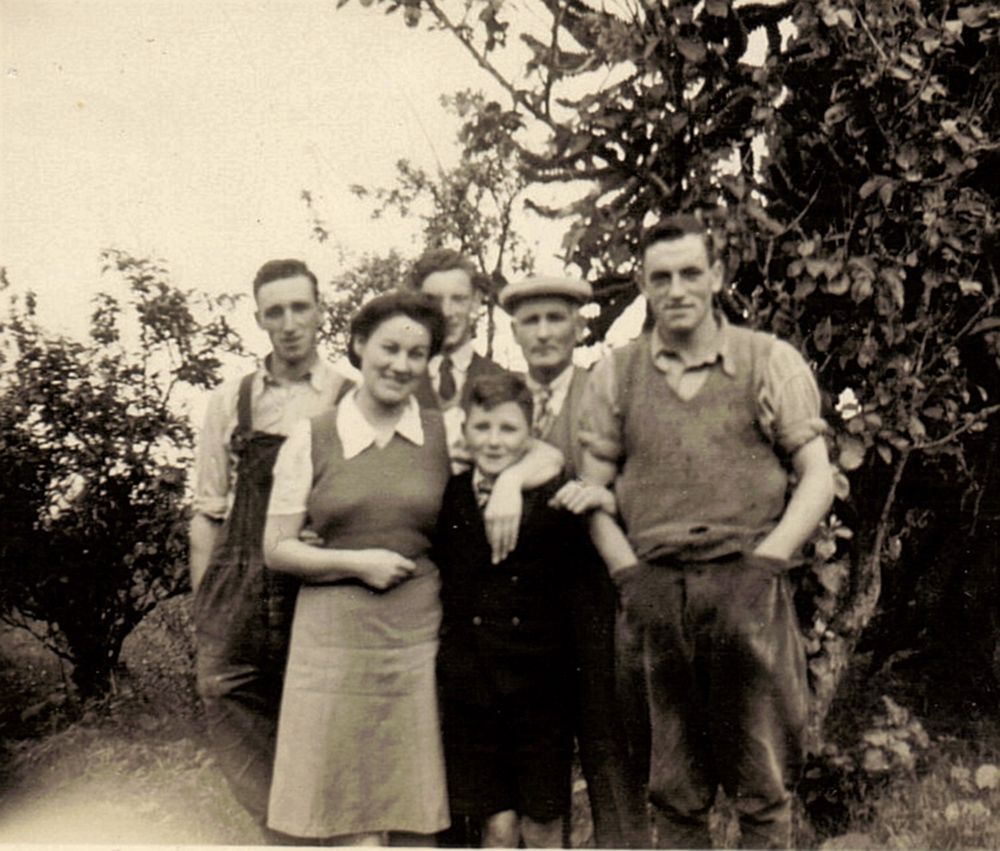 A black and white photo of a group of people 