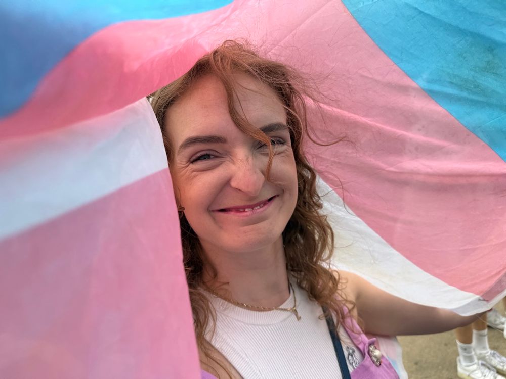 Lucy with trans flag