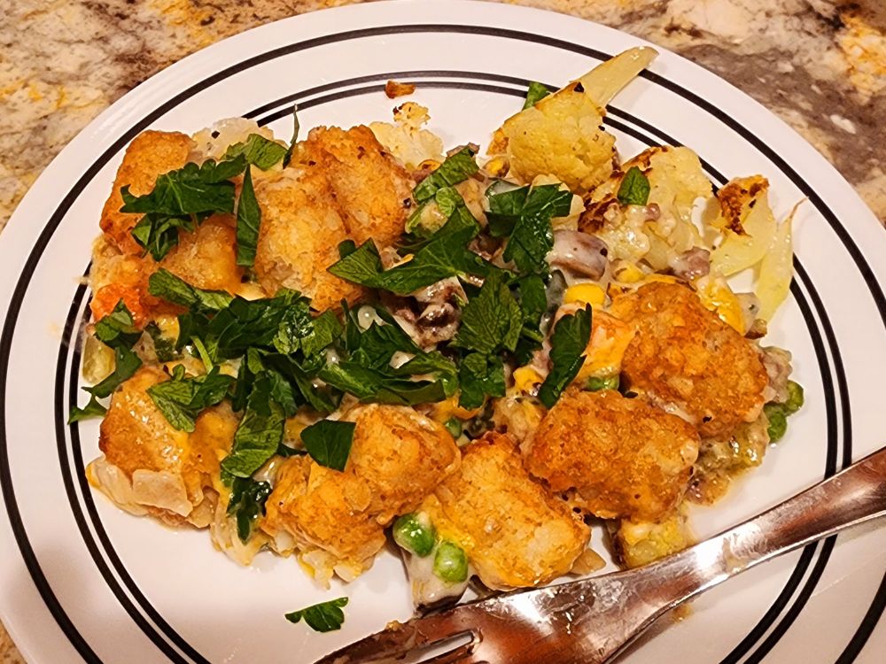 Hot dish and cauliflower on a plate 