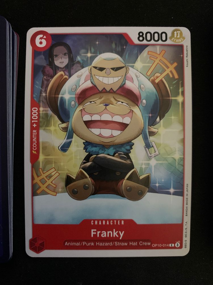 A One Piece trading card showing Tony Tony Chopper’s body, but really Franky is trapped inside. Robin is in the background looking disgusted. The card reads: “Franky - animal/punk hazard/ straw hat crew”