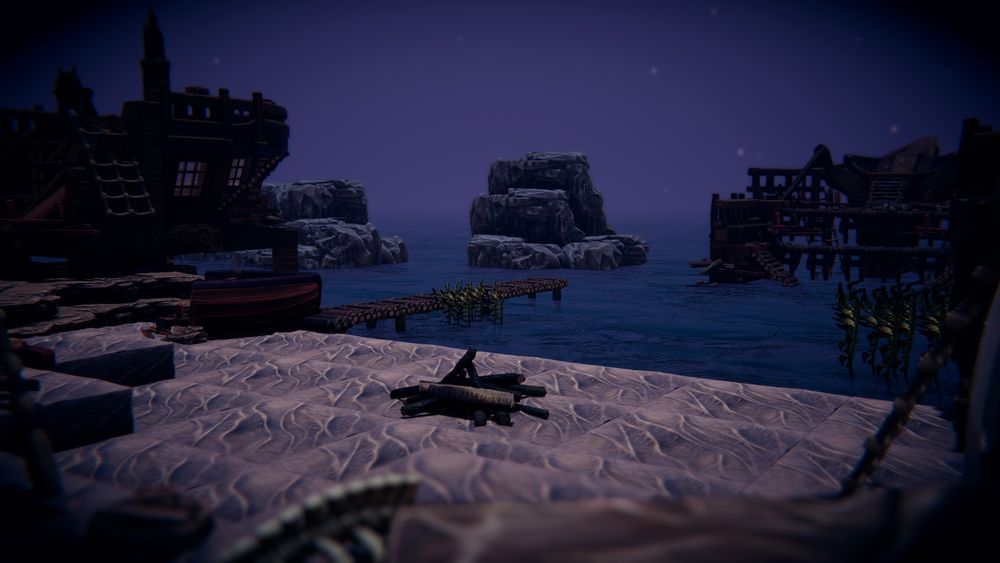 A screenshot from TaleSpire that shows a beach scene near the sea. There are some parts of ships that have been repurposed into shelter