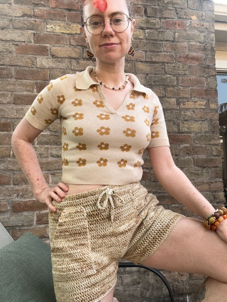 Posing with one knee up, showing off the patch pockets.