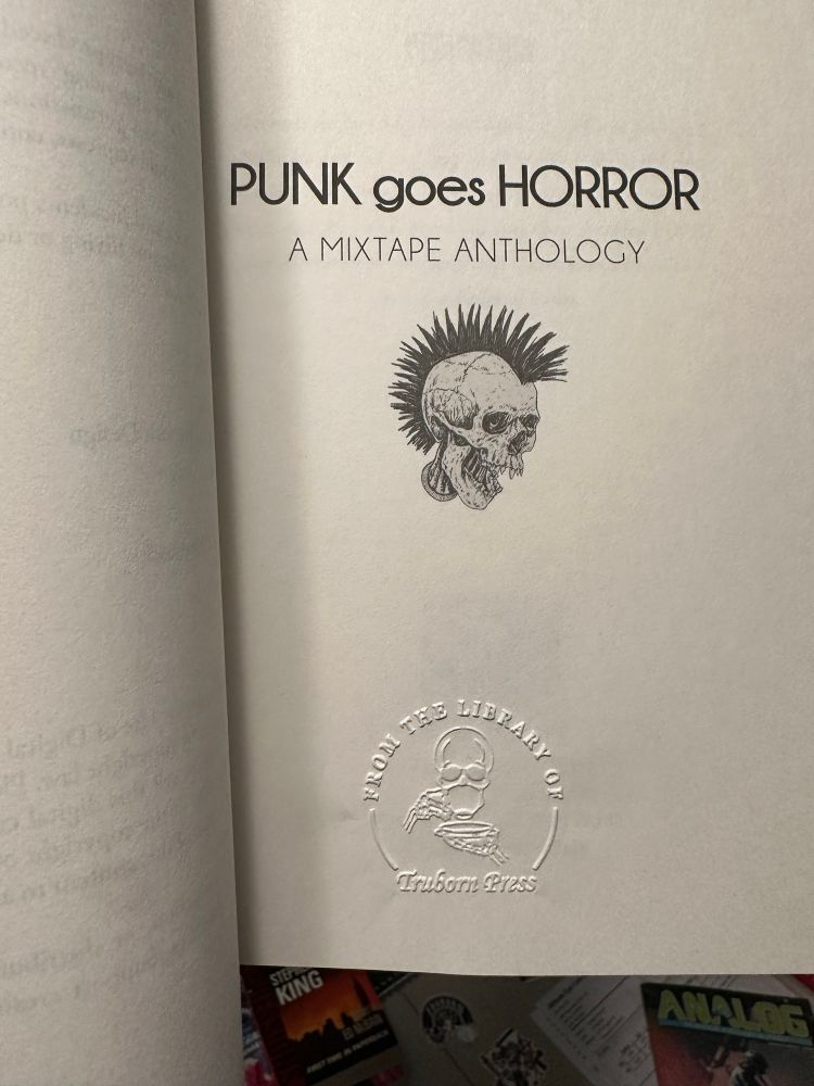 Title page of Punk Goes Horror anthology with Truborn Press library stamp embossed at bottom 