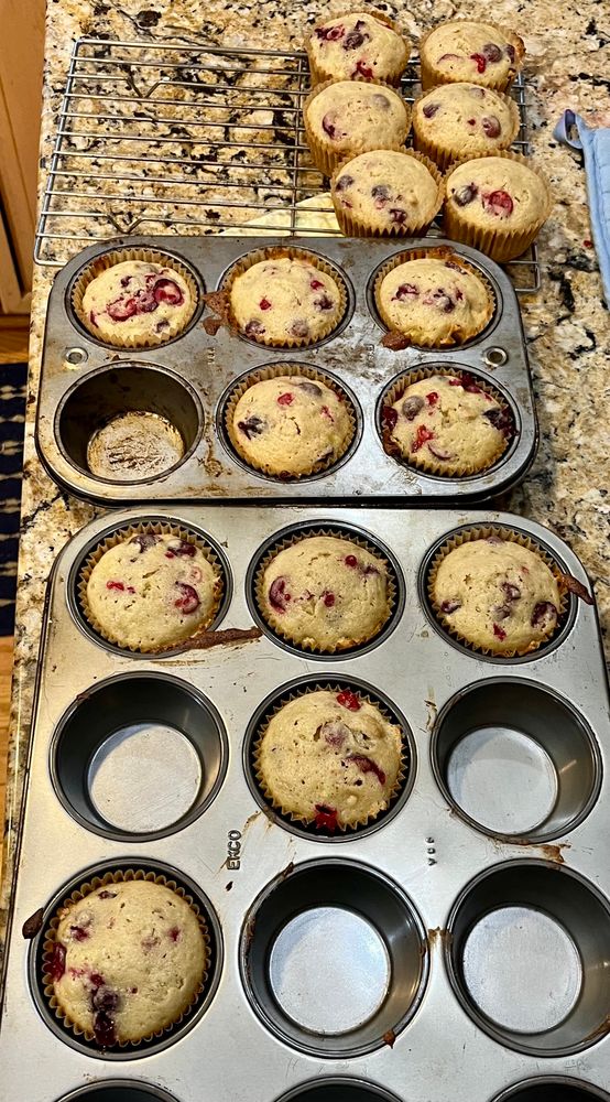 A batch of freshly baked banana cranberry muffins