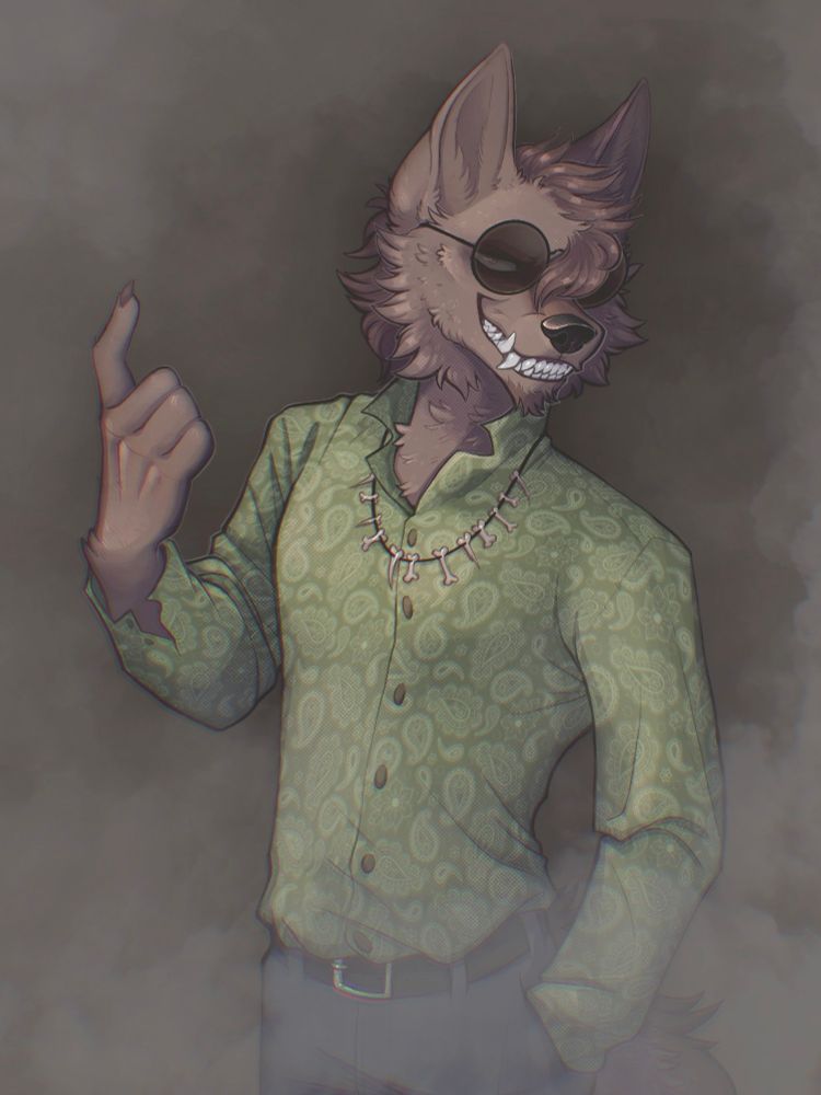 Barker wearing a paisley shirt and sunglasses