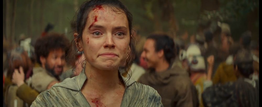 Rey has just returned from the Battle of Exegol, she is covered in blood and has tears in her eyes as she tries to smile.