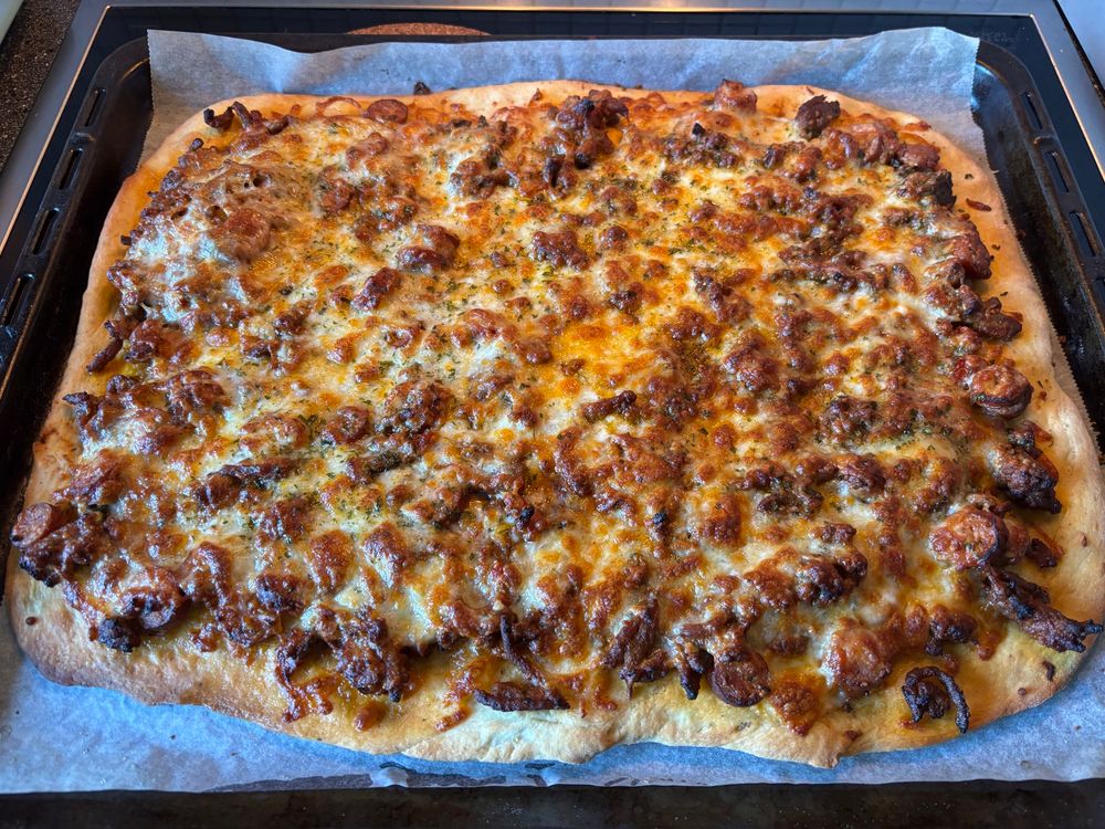 Slightly burnt homemade pizza