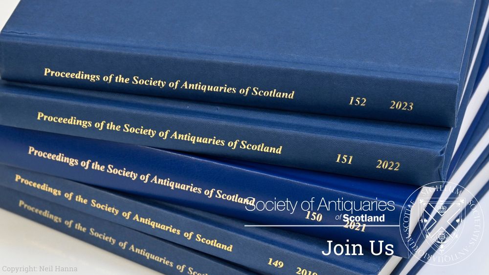 Blue books piled on top of each other with gold text on them that reads 'Proceedings of the Society of Antiquaries of Scotland'