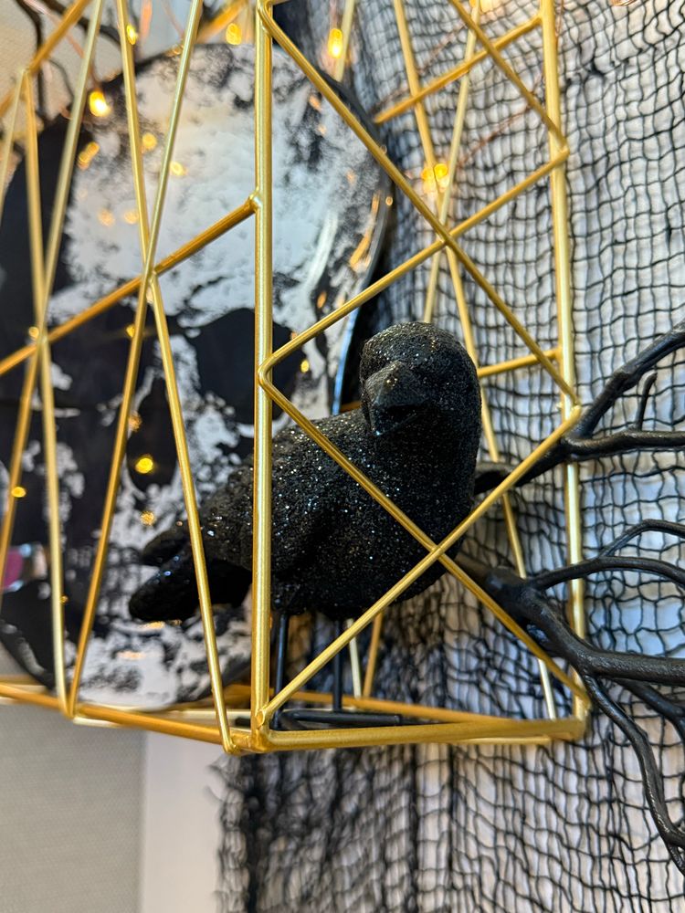 The glitter corvid in question. His name is Edgar, obviously.