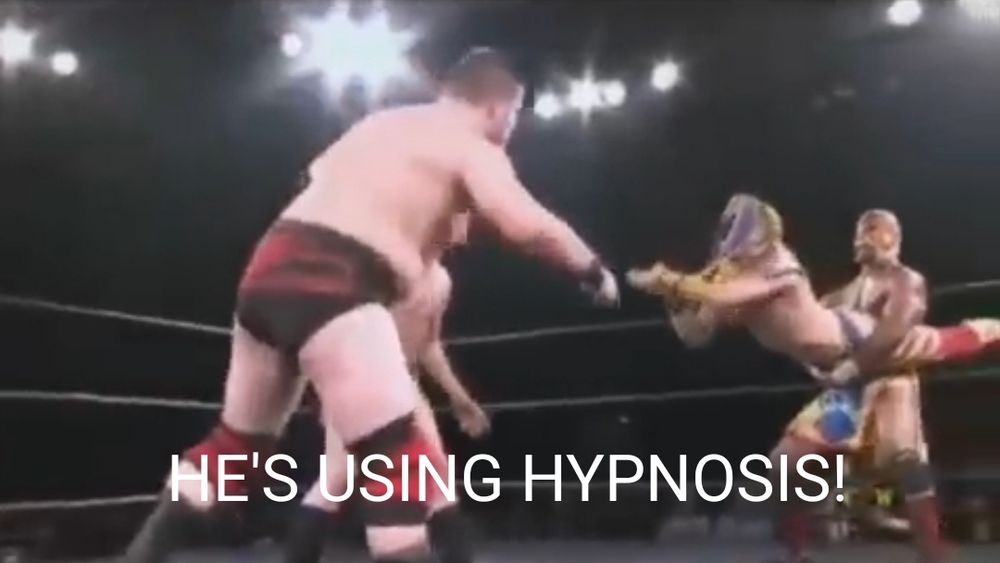 Wrestlers using hypnosis in a tag team match, the most illegal move in wrestling
