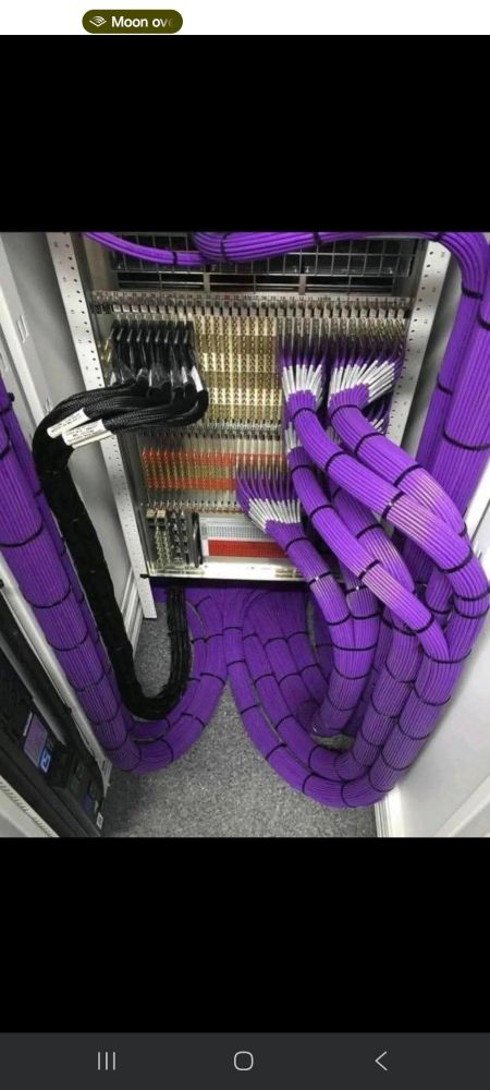 Tidy network cables  neatly  held in place by cable ties.