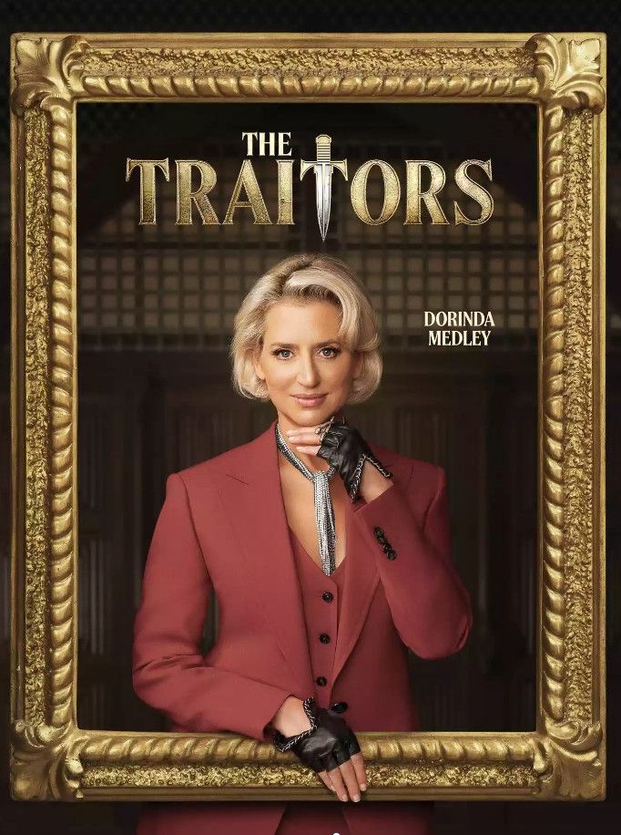 Picture frame of a reality TV legend in a red jacket posing awkwardly 