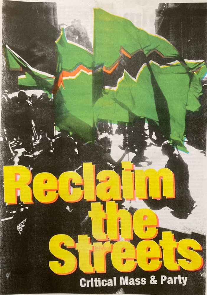 Reclaim the streets poster - showing flags from a 1997 street party