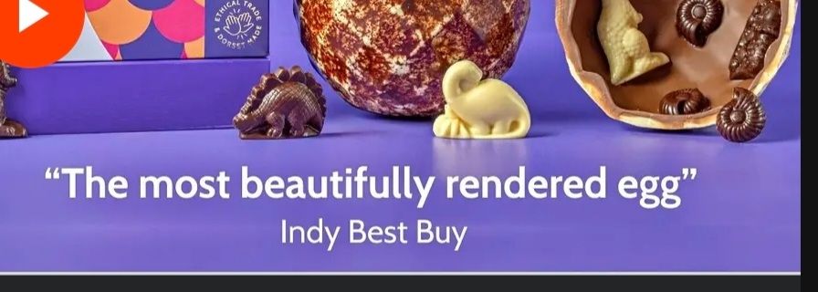 Advert that says "The most beautifully rendered egg" below an Easter egg and some chocolate dinosaurs