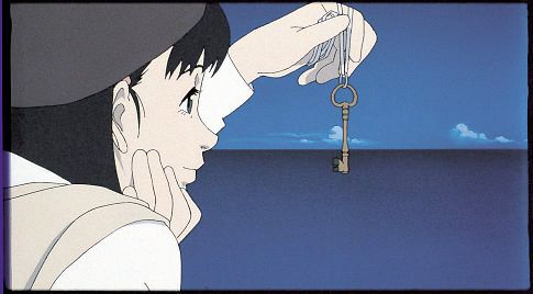 An animated image of a young girl dangling a key out in front of her face, looking out over the ocean. It's from Millennium Actress.