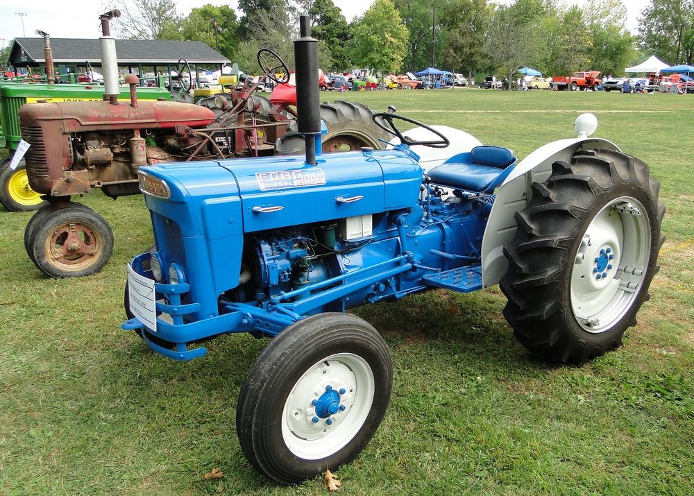 A blue and white farm tractor