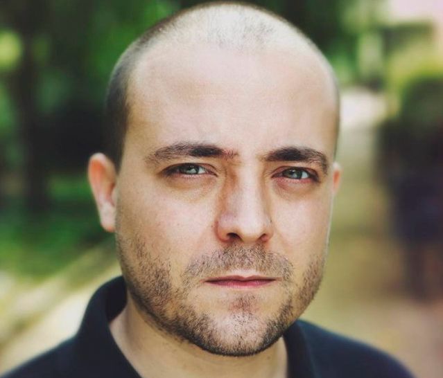 Random white guy staring frustratingly into the camera. No caption but it’s the photo from the Onion article titled “Devastating: the worst person you know just made a really great point.”