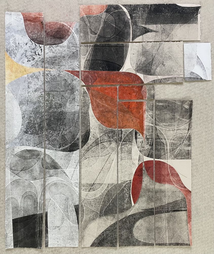 small heavily embossed monoprints on paper in shades of orange and black with textured, curved shapes and a range of tones in the inked areas.