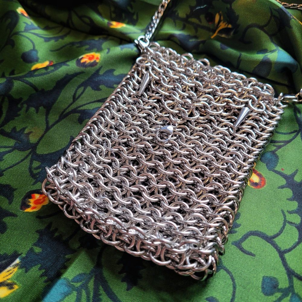 chainmail pouch, stainless steel, roughly casette tape sized
