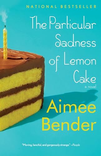 Cover for the book "The Particular Sadness of Lemon Cake" by Aimee Bender. The cover is blue and features a photograph of a slice of yellow cake with chocolate frosting and an extinguished yellow candle.