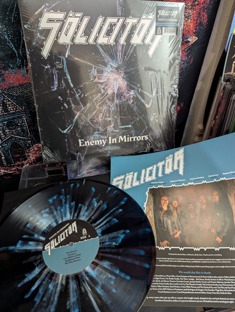 Blue splatter vinyl and album cover for Solicitor - Enemy in Mirrors.