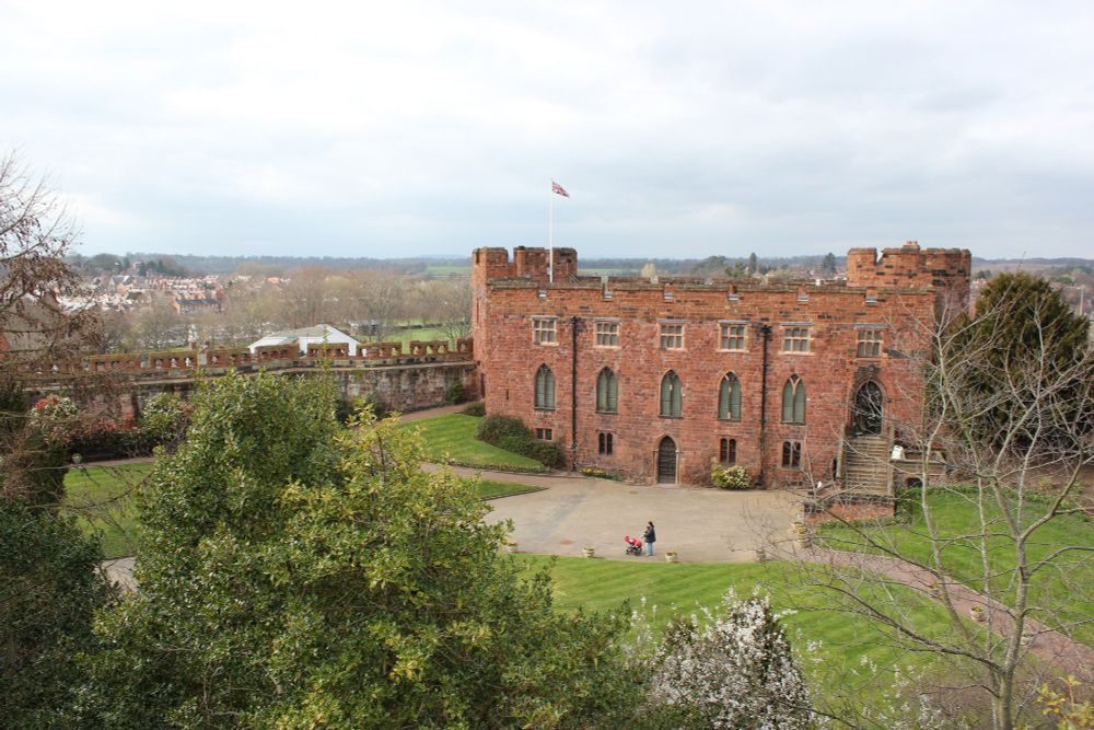 Shrewsbury Castle, looking from Laura's Tower, Shrewsbury Castle is a red sandstone three storied building flanked on two sides (east and west) by towers that rise just above the main roofline.