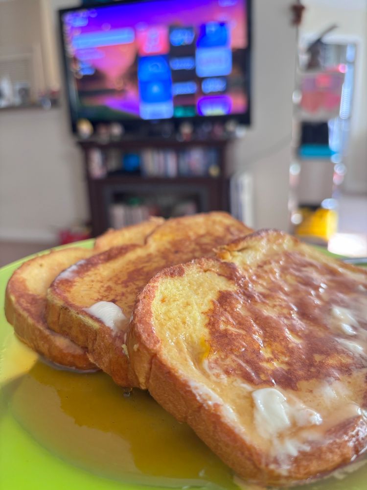 French toast with butter and maple syrup 
