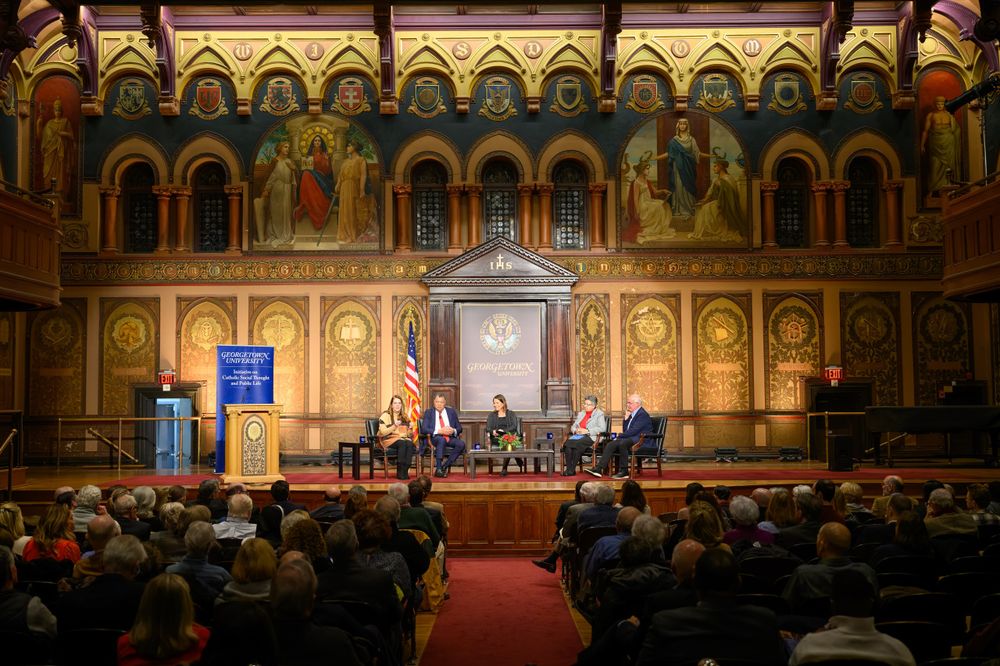 Photo of Gaston Hall at Georgetown University with audience and participants in the Public Dialogue “What Do We Do Now? Catholic Responsibilities, Opportunities After the Election and Synod” hosted by the Initiative on Catholic Social Thought and Public Life.