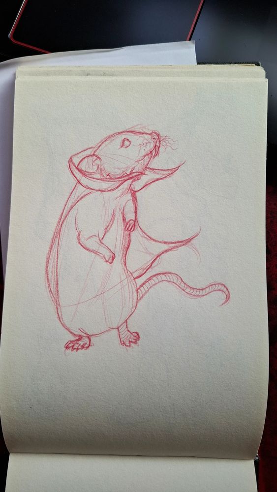 Un boceto de un ratón con los dientes largos y una capa muy vampírica