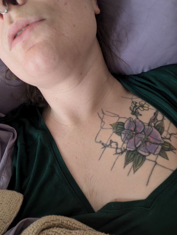 tattoo of princess flower on eevee's chest