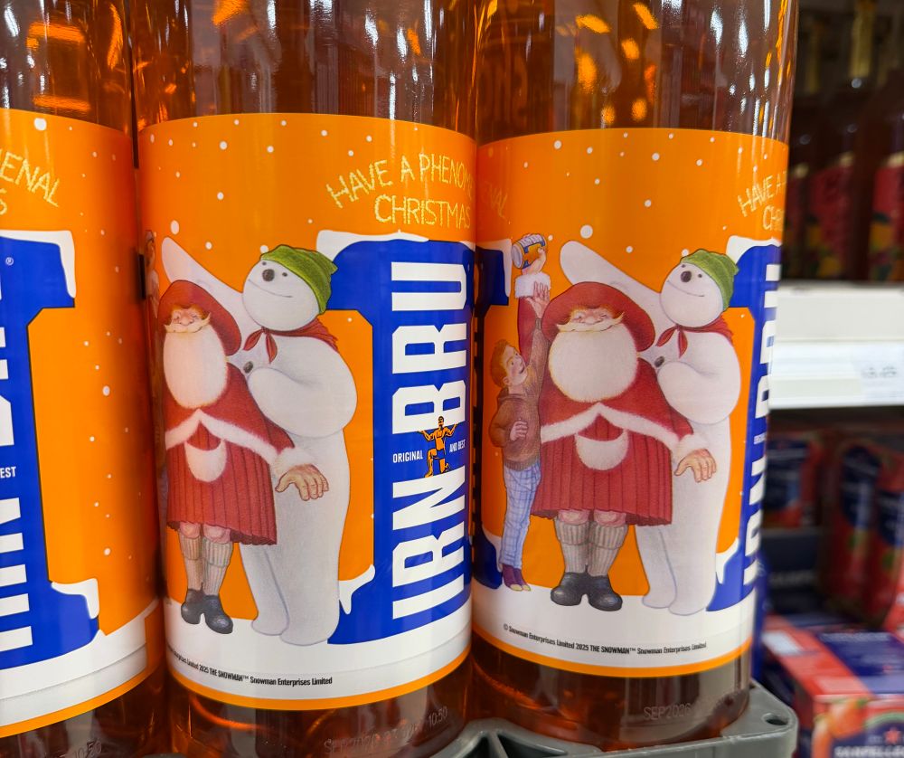  Irn bru bottles with the Snowman and Santa on the label. 