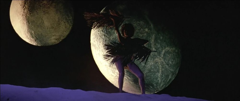 From Star Trek V, Uhura dancing in the sand with leaves. 